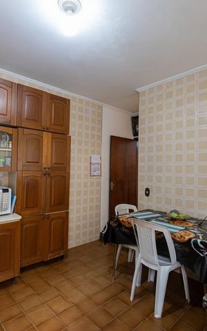 Casa à venda com 104m², 3 quartos e 2 vagas Casa à venda com 104m², 3 quartos e 2 vagasCozinha