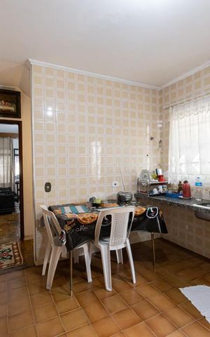 Casa à venda com 104m², 3 quartos e 2 vagas Casa à venda com 104m², 3 quartos e 2 vagasCozinha