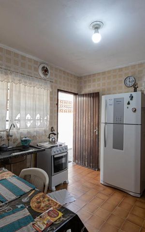 Casa à venda com 104m², 3 quartos e 2 vagas Casa à venda com 104m², 3 quartos e 2 vagasCozinha