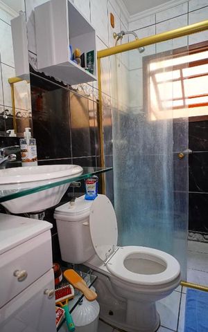 Casa à venda com 300m², 4 quartos e 2 vagasSuite - Banheiro