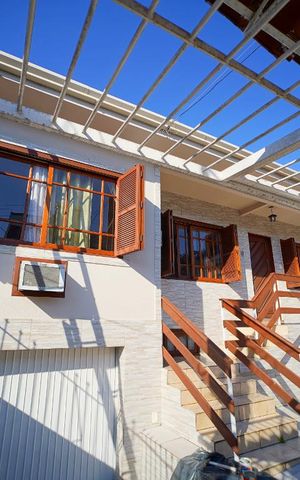 Casa à venda com 300m², 4 quartos e 2 vagasFachada frente
