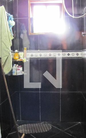 Casa à venda com 413m², 5 quartos e 6 vagasBanheiro Suíte 2