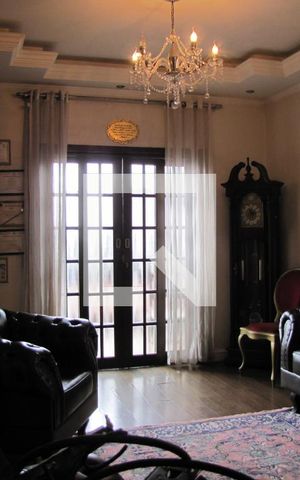 Casa à venda com 413m², 5 quartos e 6 vagasSala