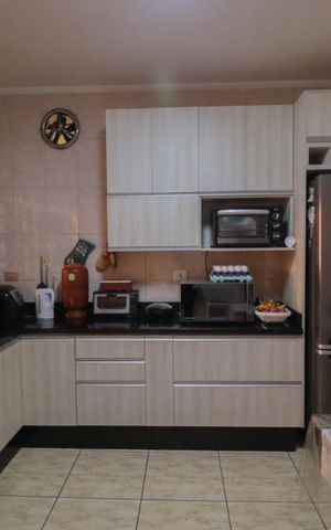 Casa à venda com 150m², 3 quartos e 2 vagas Casa à venda com 150m², 3 quartos e 2 vagasCozinha