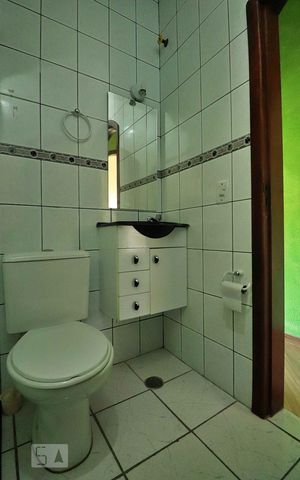 Casa à venda com 302m², 3 quartos e 2 vagasBanheiro Social