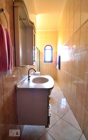 Casa à venda com 302m², 3 quartos e 2 vagasBanheiro da Suíte