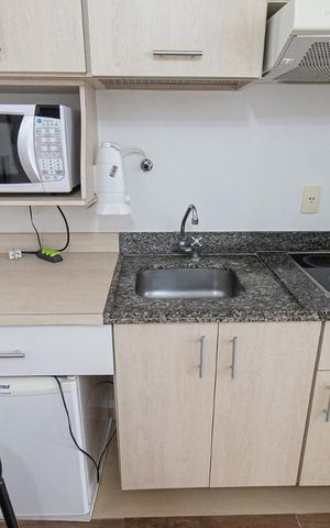 Studio para alugar com 33m², 1 quarto e 1 vaga Studio para alugar com 33m², 1 quarto e 1 vagaCozinha
