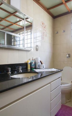 Casa à venda com 570m², 4 quartos e 4 vagasBanheiro Suíte 1