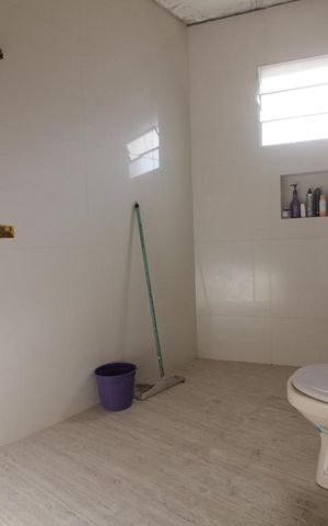 Casa à venda com 380m², 4 quartos e 3 vagasBanheiro da suíte