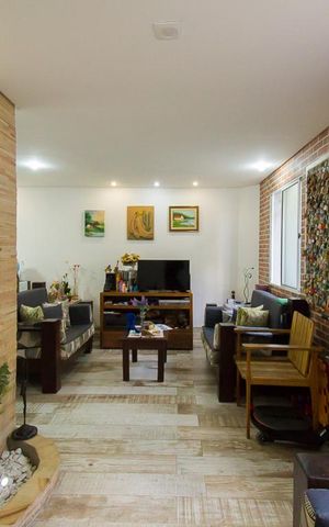 Casa de condomínio à venda com 137m², 3 quartos e 1 vagaSala