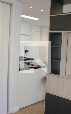 Studio para alugar com 38m², 1 quarto e 1 vagaEstante quarto, visão da cozinha e sala