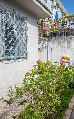 Casa à venda com 80m², 3 quartos e 1 vaga Casa à venda com 80m², 3 quartos e 1 vagaVaranda
