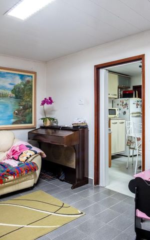 Casa à venda com 130m², 3 quartos e 2 vagas Casa à venda com 130m², 3 quartos e 2 vagasSala