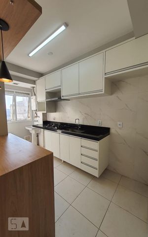 Apartamento à venda com 50m², 1 quarto e 1 vaga Apartamento à venda com 50m², 1 quarto e 1 vagaCozinha e Área de Serviço