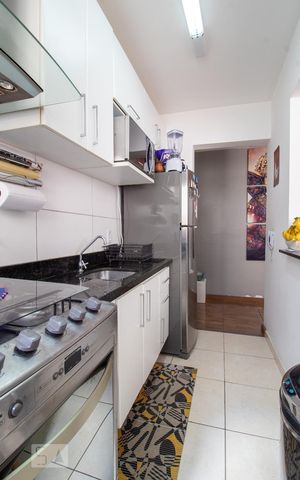 Apartamento à venda com 60m², 3 quartos e 1 vaga Apartamento à venda com 60m², 3 quartos e 1 vagaCozinha e Área de Serviço
