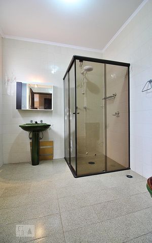 Casa à venda com 340m², 4 quartos e 4 vagasBanheiro da Suíte 2