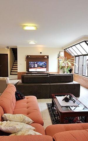 Casa à venda com 340m², 4 quartos e 4 vagasSala