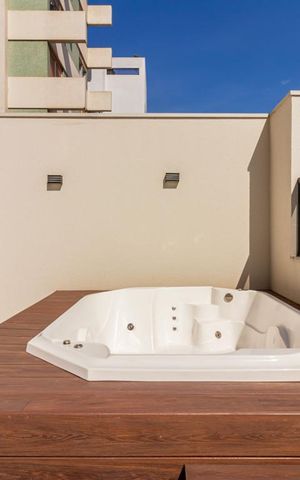 Studio à venda com 77m², 1 quarto e 2 vagas Studio à venda com 77m², 1 quarto e 2 vagasVaranda gourmet