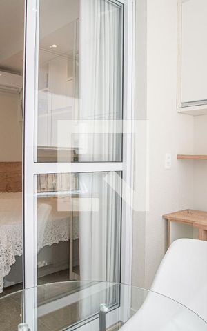 Studio para alugar com 24m², 1 quarto e sem vaga Studio para alugar com 24m², 1 quarto e sem vagaVaranda da Sala/Quarto