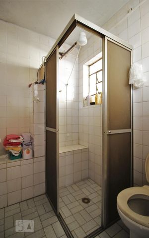 Casa de condomínio à venda com 78m², 3 quartos e 2 vagasBanheiro da suite