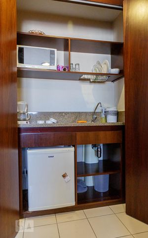 Apartamento à venda com 27m², 1 quarto e 1 vaga Apartamento à venda com 27m², 1 quarto e 1 vagaCozinha