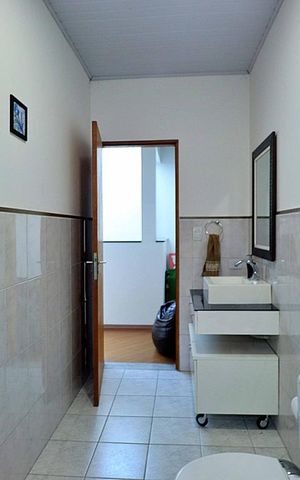 Casa para alugar com 296m², 5 quartos e 4 vagasBanheiro Social 1