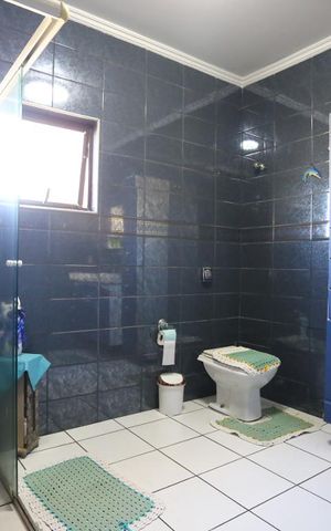 Casa para alugar com 210m², 5 quartos e 7 vagasBanheiro 2