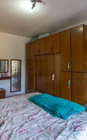 Casa à venda com 143m², 2 quartos e 2 vagas Casa à venda com 143m², 2 quartos e 2 vagasQuarto 2 - Suíte