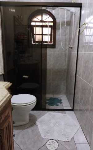 Casa à venda com 250m², 3 quartos e 3 vagasBanheiro 3
