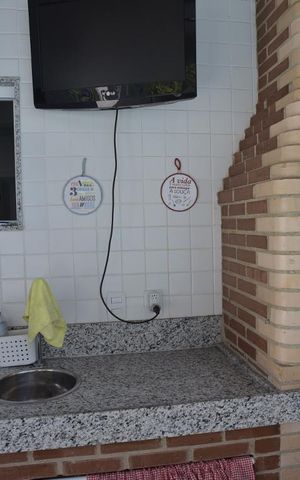 Casa de condomínio à venda com 130m², 3 quartos e 2 vagasChurrasqueira