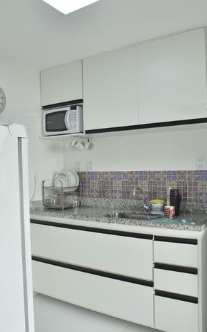 Casa de condomínio à venda com 130m², 3 quartos e 2 vagasCozinha