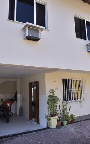 Casa de condomínio à venda com 130m², 3 quartos e 2 vagasFachada