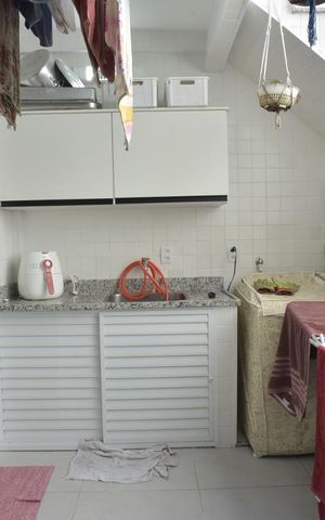 Casa de condomínio à venda com 130m², 3 quartos e 2 vagasLavanderia