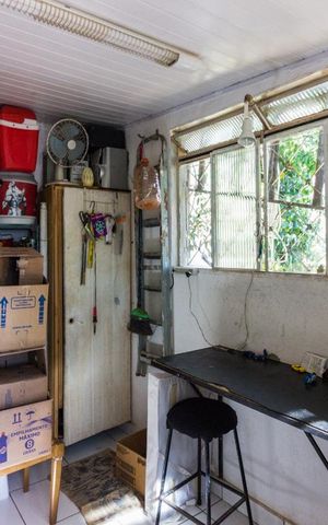 Casa à venda com 440m², 4 quartos e 2 vagasQuarto de Serviço 2