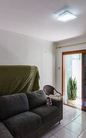 Casa à venda com 440m², 4 quartos e 2 vagasSala