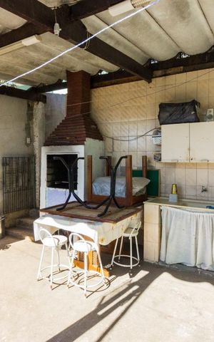 Casa à venda com 440m², 4 quartos e 2 vagasVaranda