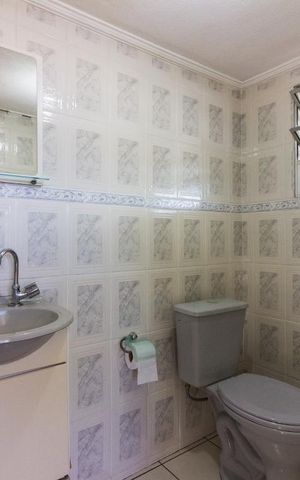 Casa à venda com 440m², 4 quartos e 2 vagasBanheiro 2