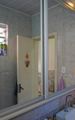 Casa à venda com 330m², 3 quartos e sem vagaBanheiro - sala 1