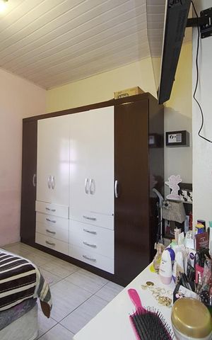 Casa à venda com 80m², 2 quartos e 2 vagasQuarto 1