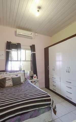 Casa à venda com 80m², 2 quartos e 2 vagasQuarto 1