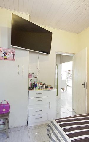 Casa à venda com 80m², 2 quartos e 2 vagasQuarto 1