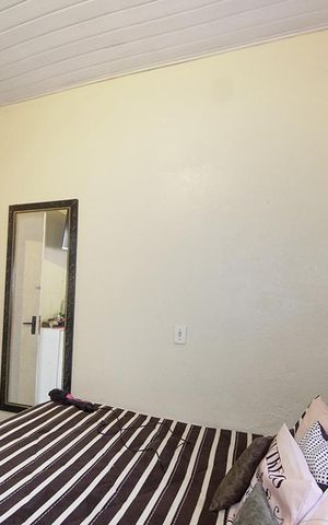 Casa à venda com 80m², 2 quartos e 2 vagasQuarto 1