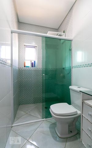 Casa à venda com 340m², 3 quartos e 8 vagasBanheiro da Suíte 2