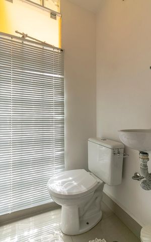 Casa à venda com 340m², 3 quartos e 8 vagasLavabo da Sala