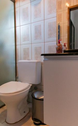 Casa à venda com 140m², 3 quartos e 2 vagasBanheiro da Suíte