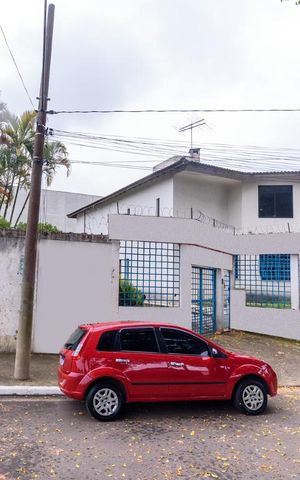 Casa à venda com 340m², 4 quartos e 4 vagas Casa à venda com 340m², 4 quartos e 4 vagasFachada