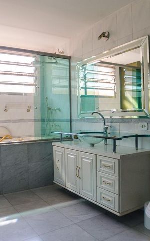 Casa à venda com 400m², 4 quartos e 4 vagasBanheiro da Suíte 1