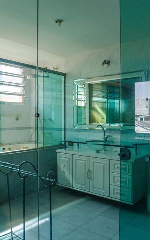 Casa à venda com 400m², 4 quartos e 4 vagasBanheiro da Suíte 1