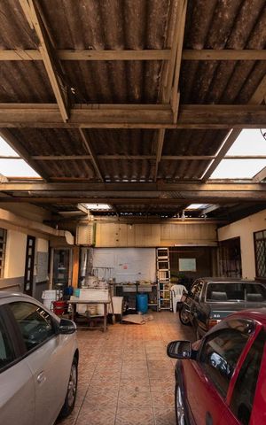 Casa à venda com 505m², 4 quartos e 5 vagas Casa à venda com 505m², 4 quartos e 5 vagasGaragem