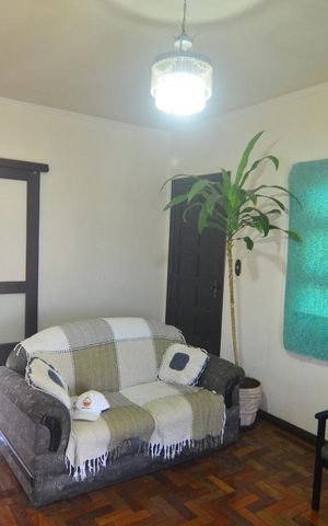 Casa à venda com 100m², 3 quartos e 2 vagasSala